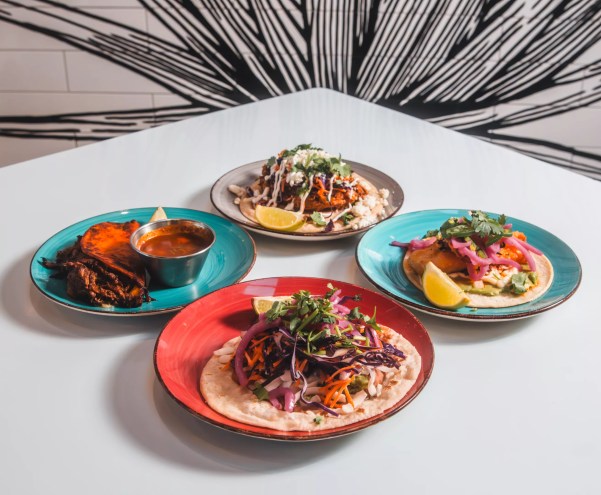 various tacos on plates