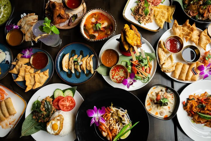 various thai dishes on a table
