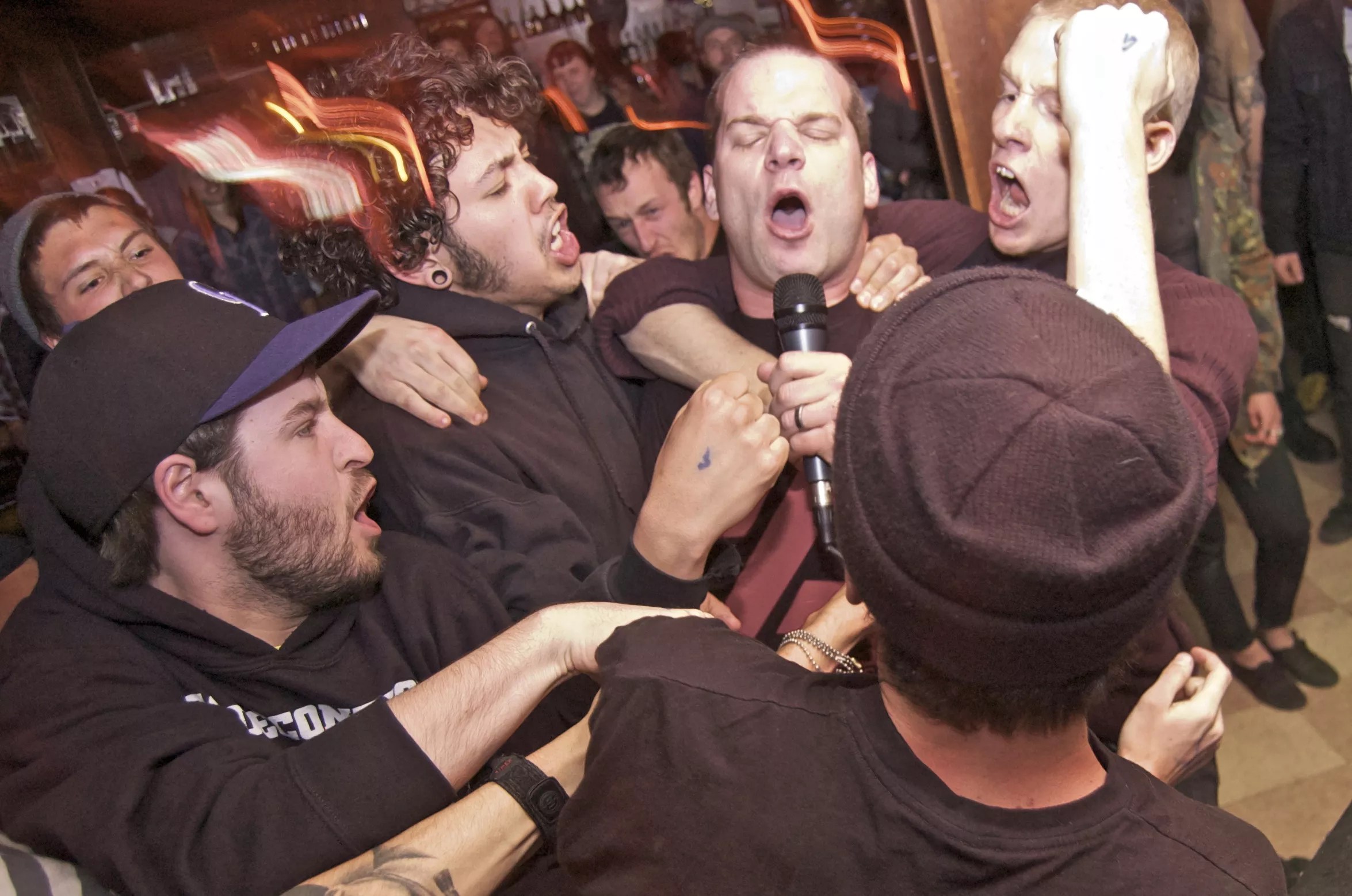 Members of Guns n' Rosa Parks in a crowd of fans