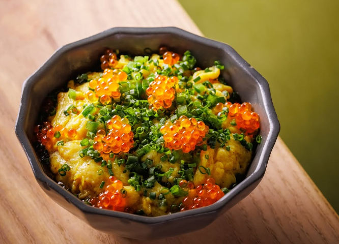 scrambled egg topped with salmon roe