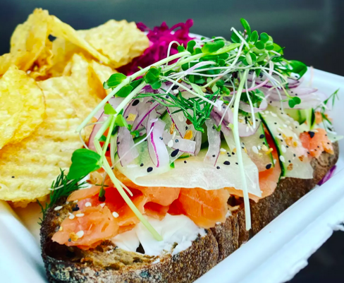 open-faced sandwich with cream cheese and smoked salmon.