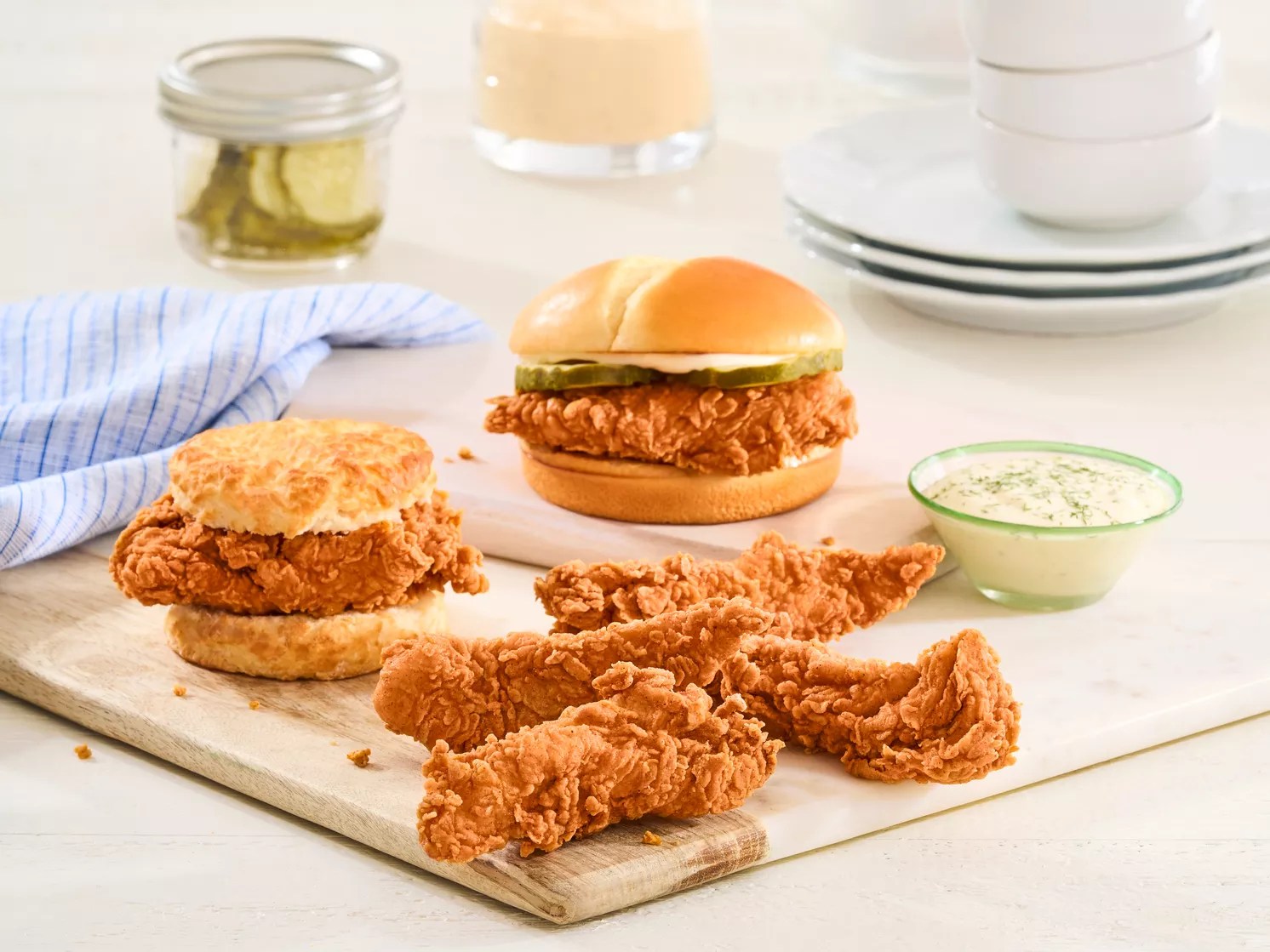 chicken tenders, fried chicken sandwich and fried chicken biscuit
