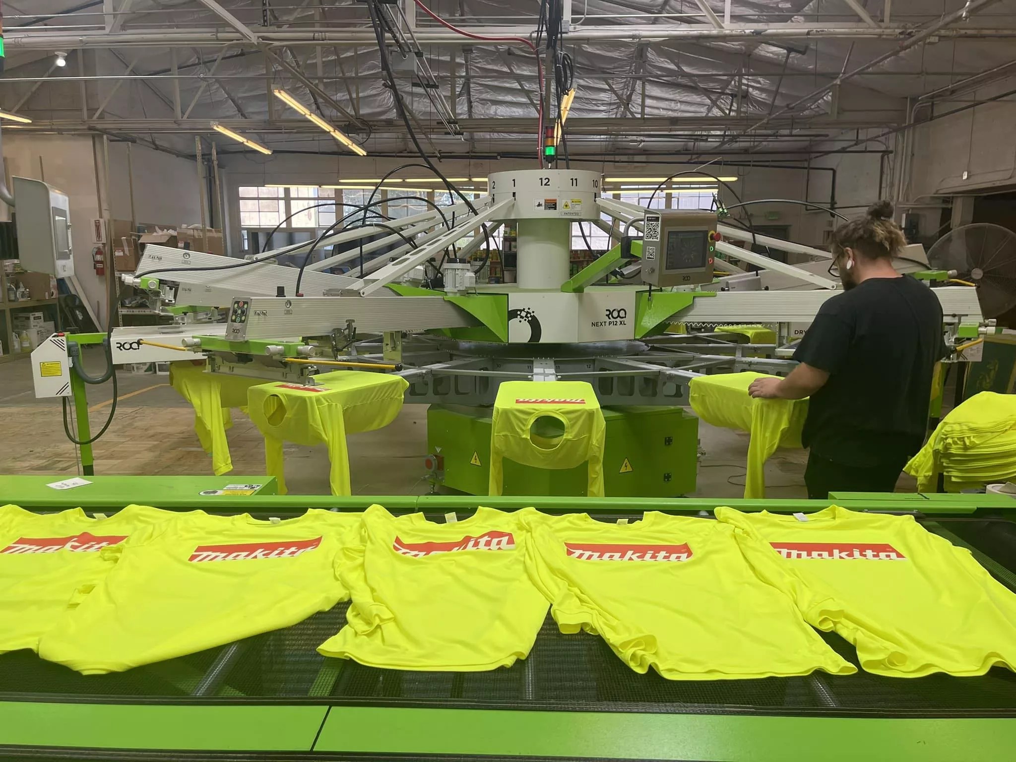 A worker in a print production shop.