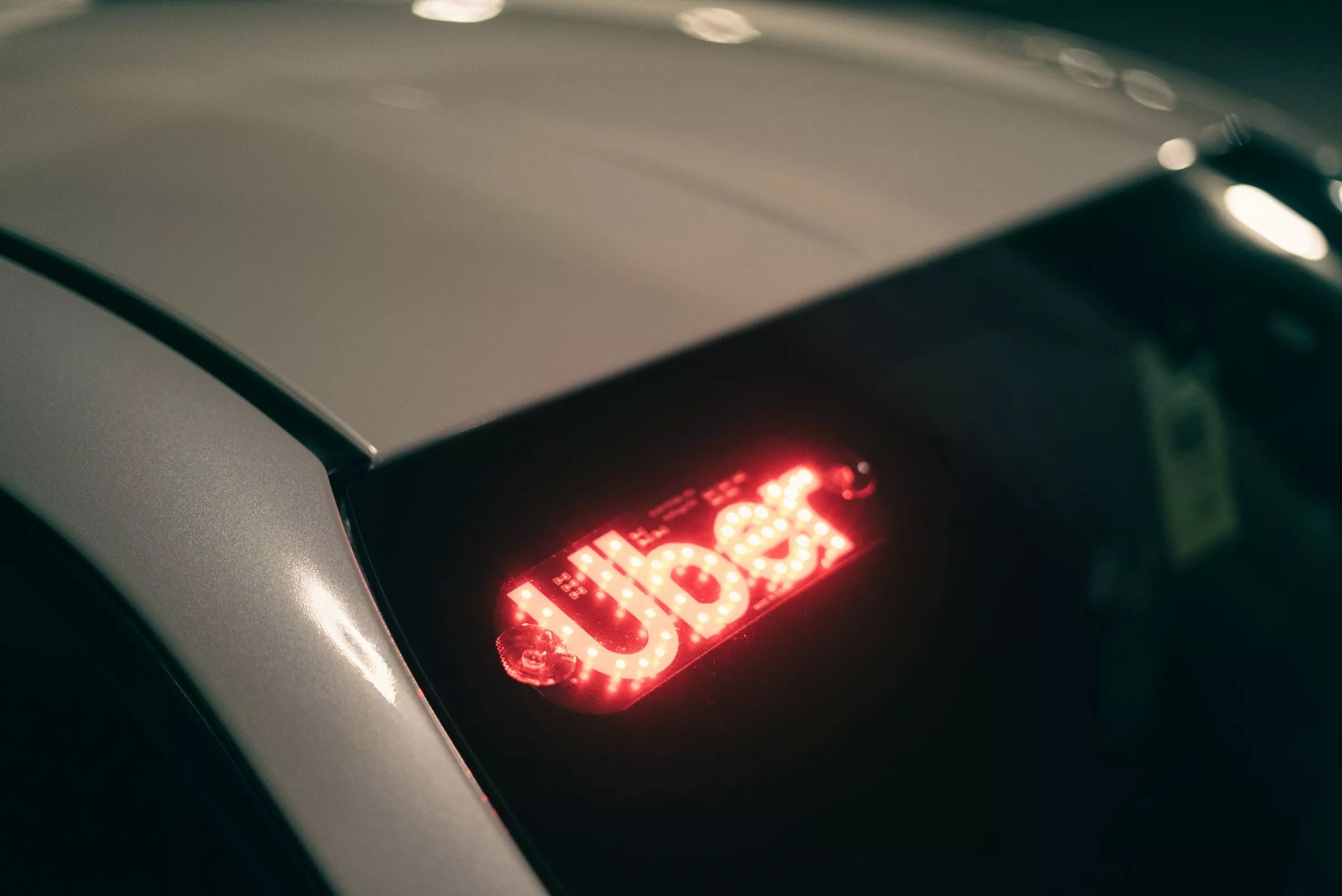 Uber car with lit up sign