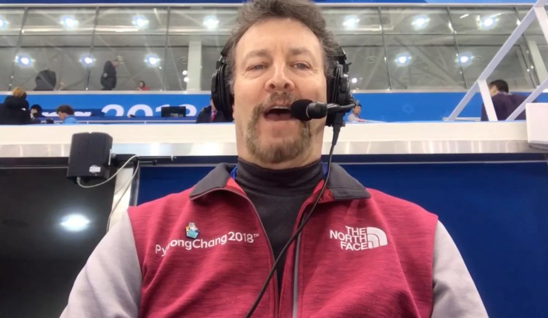 man announcing sports event