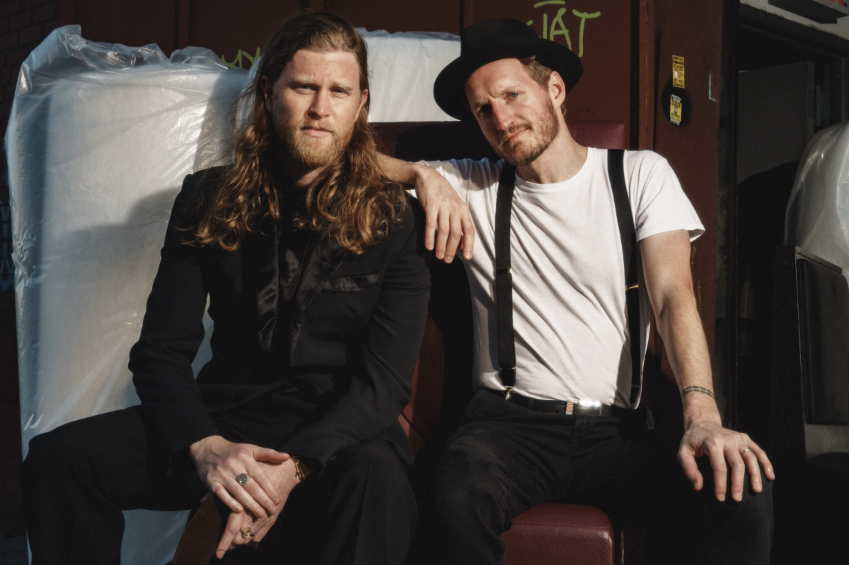two members of the lumineers