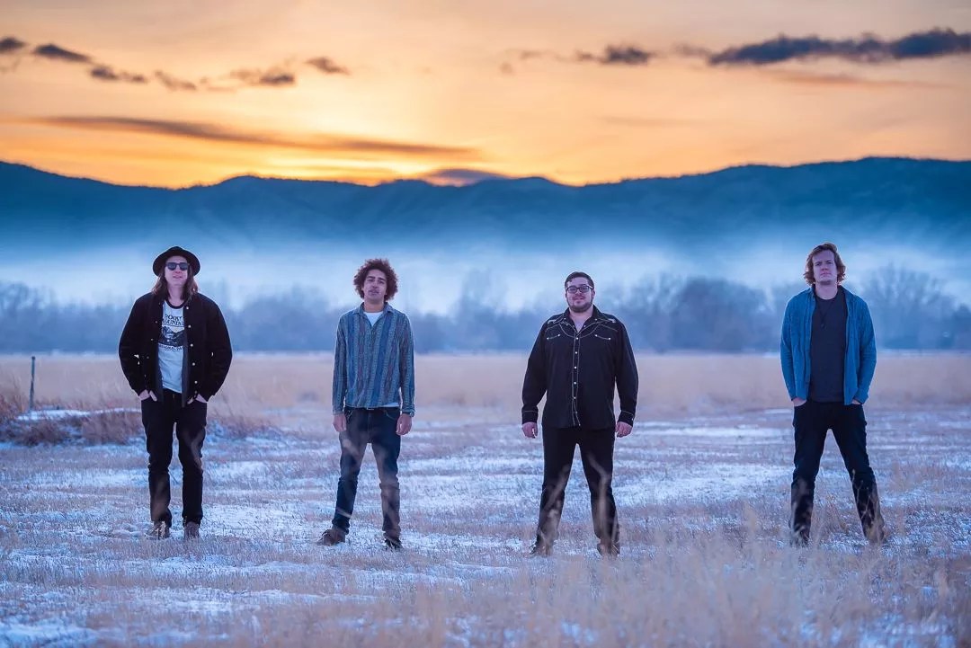 The four members of Magic Beans standing together