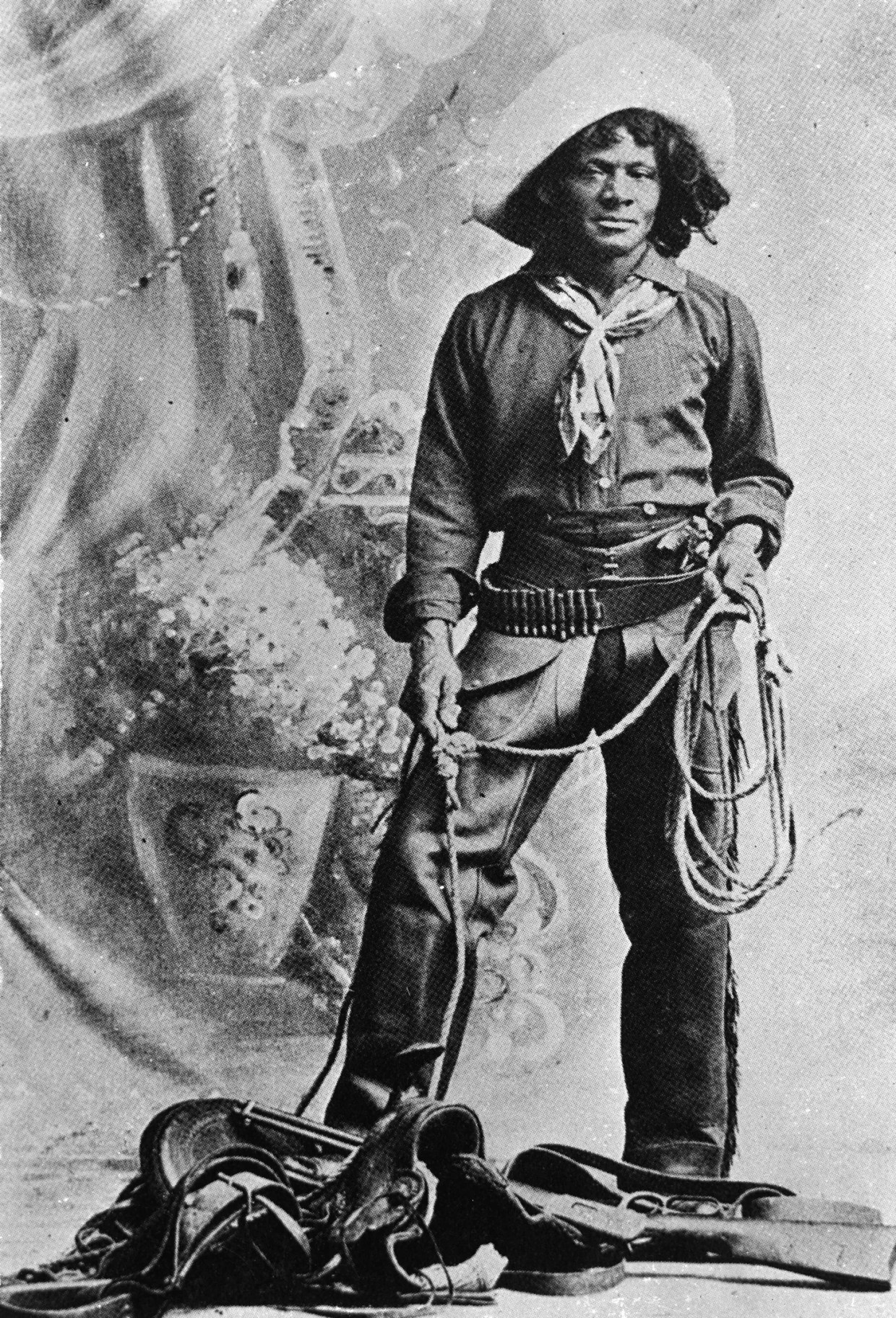 A black and white photo of a Black cowboy