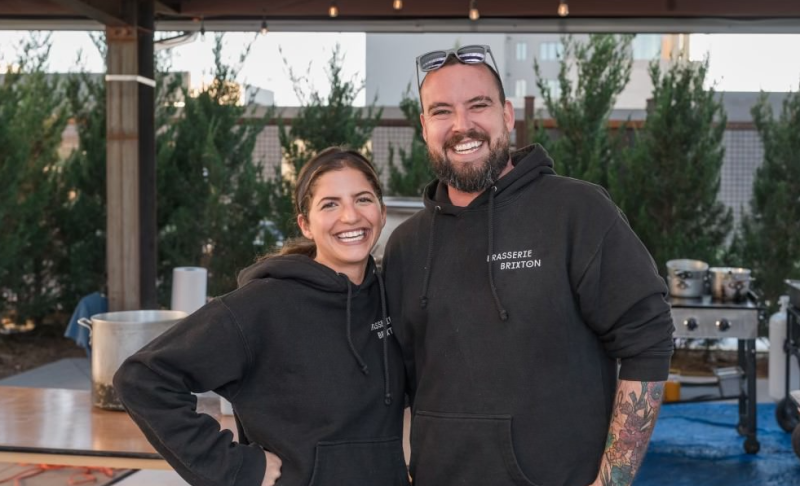woman and man in black hoodies