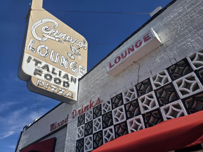 old neon sign on a building