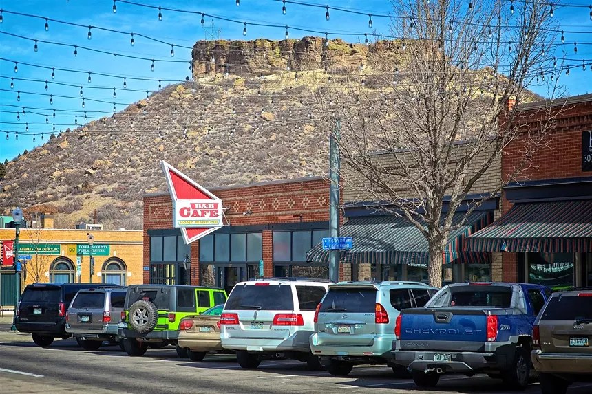 main street of town with rock behind