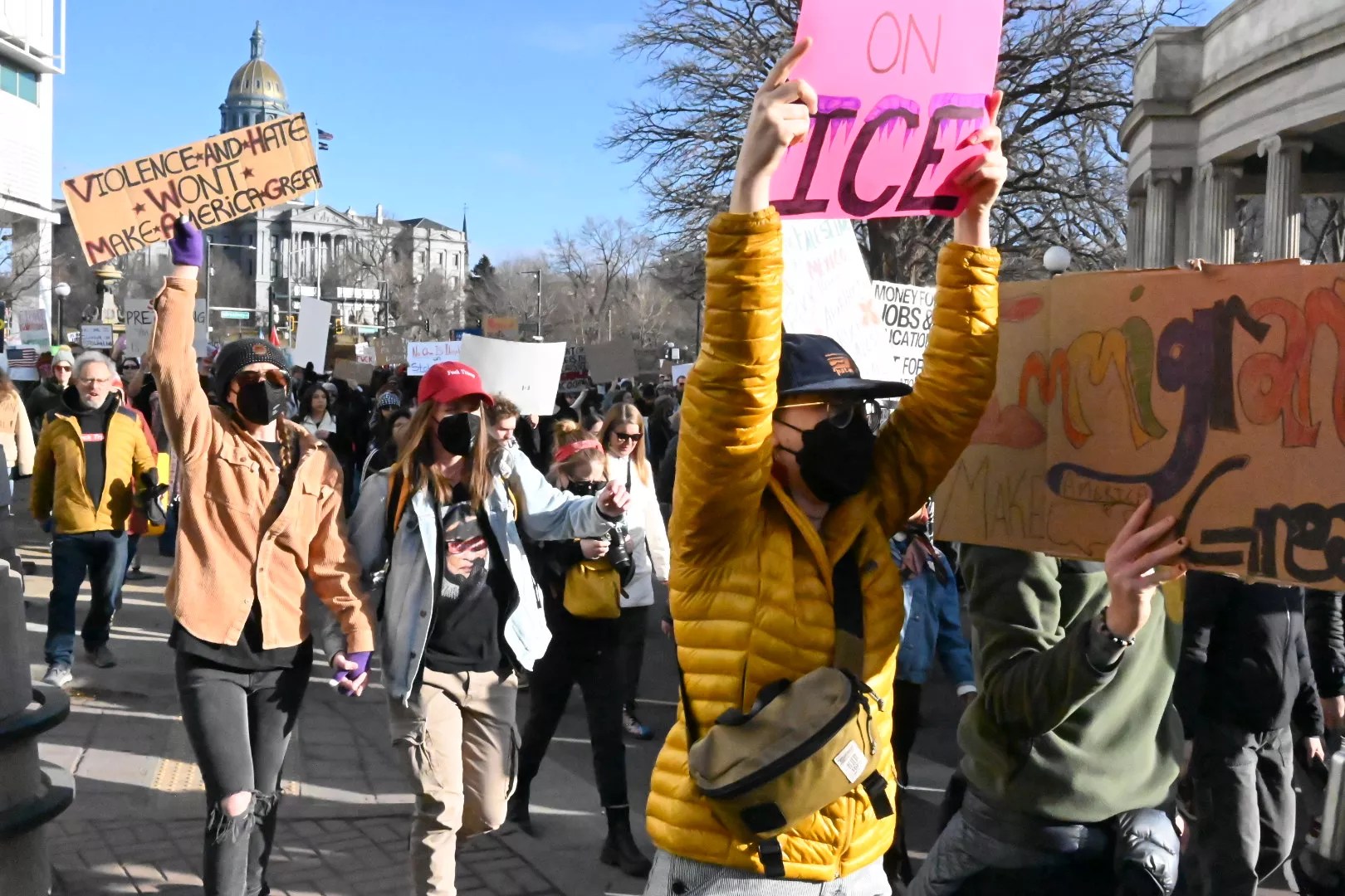 Protesters march down Colfax Avenue.