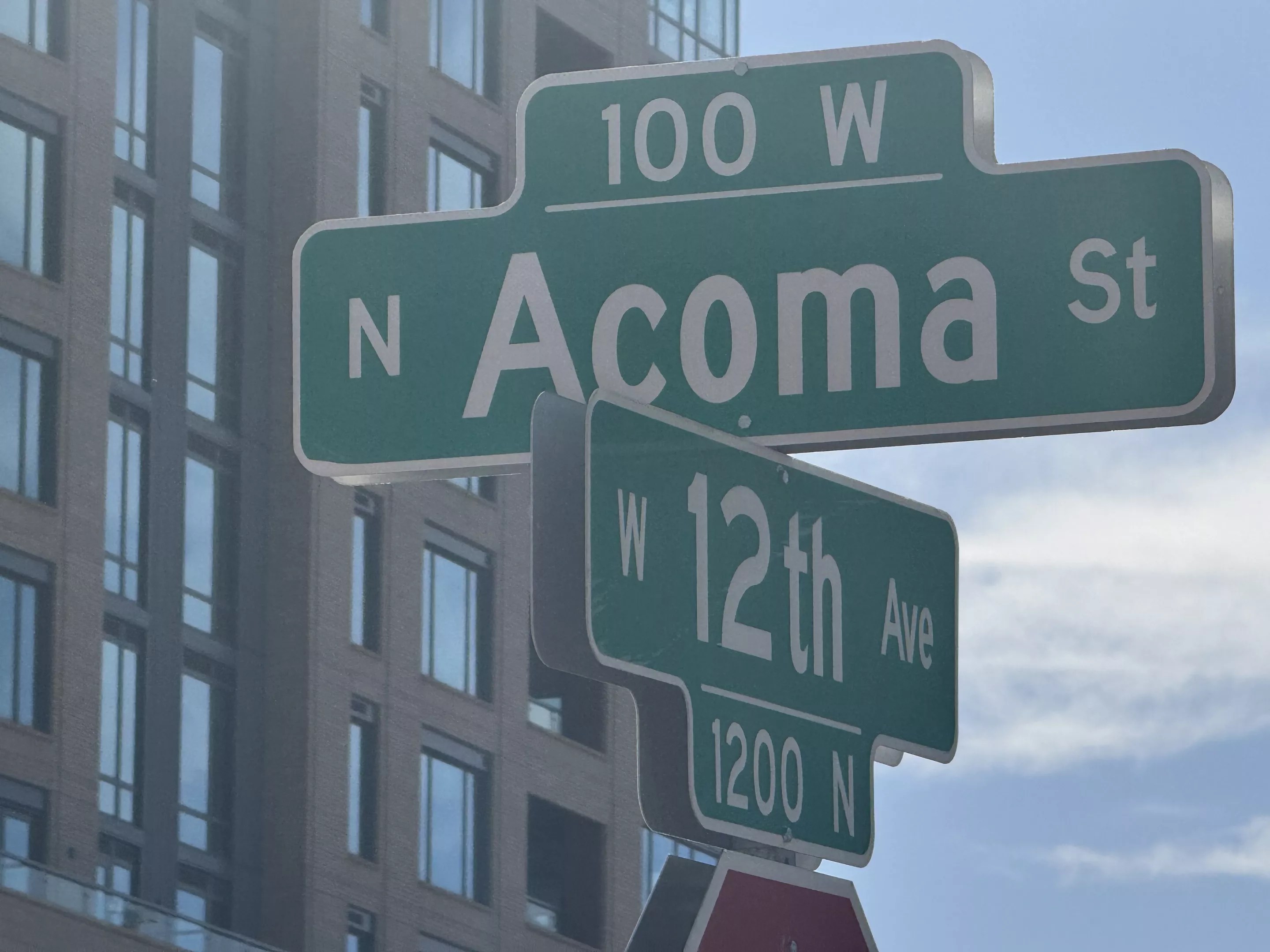 A sign for Acoma Street in Denver.