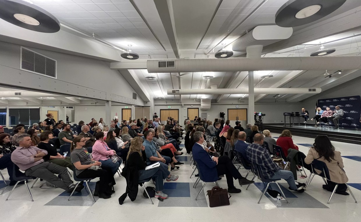 crowd of people at transgender meeting