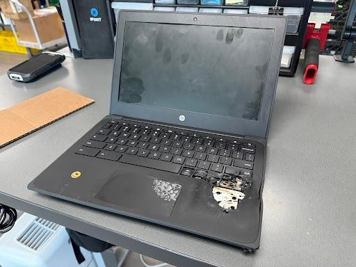 A Chromebook laptop is burnt and melted after being tampered with in order to make the lithium batter ignite.