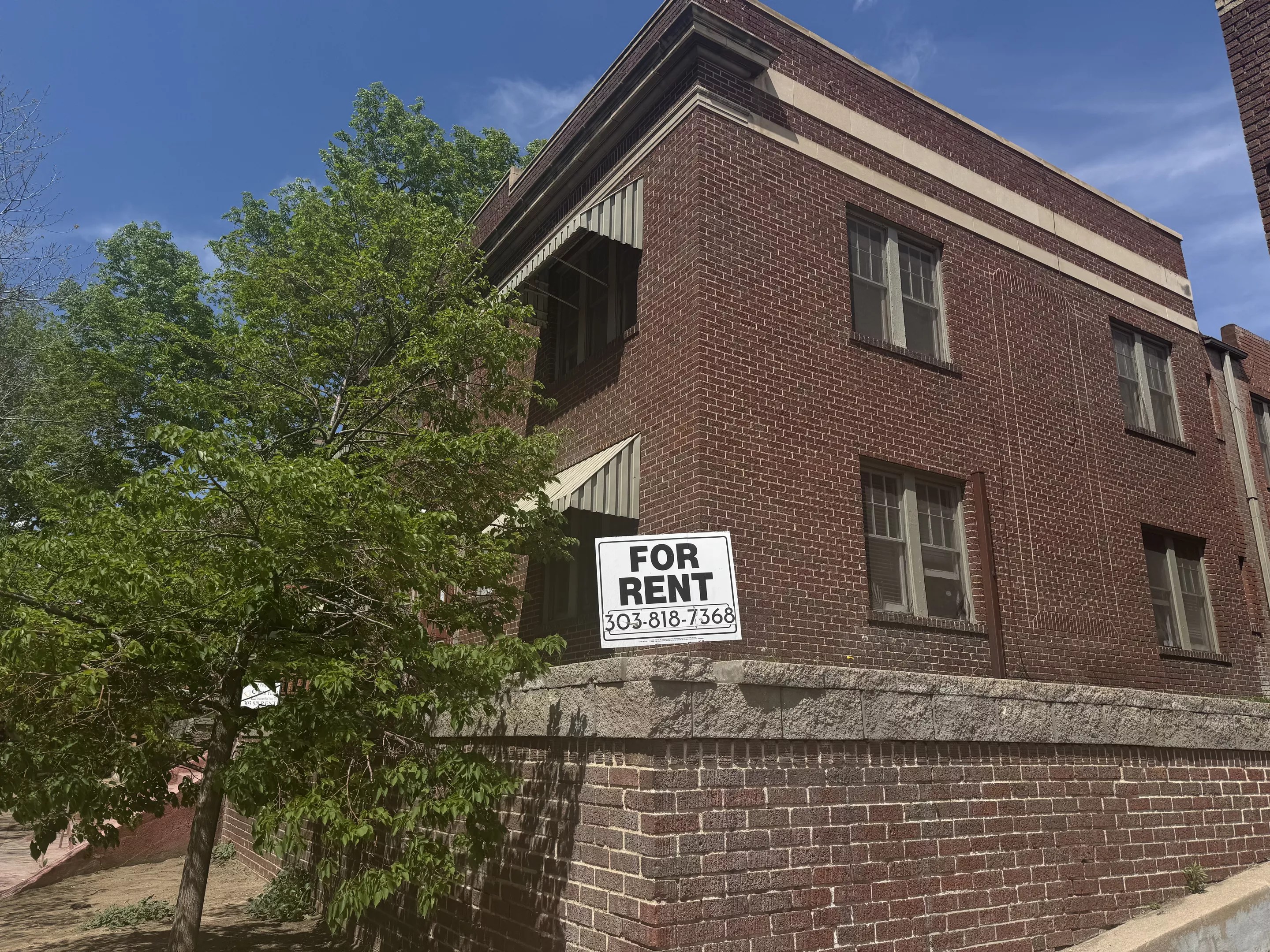 For Rent apartment sign in Denver