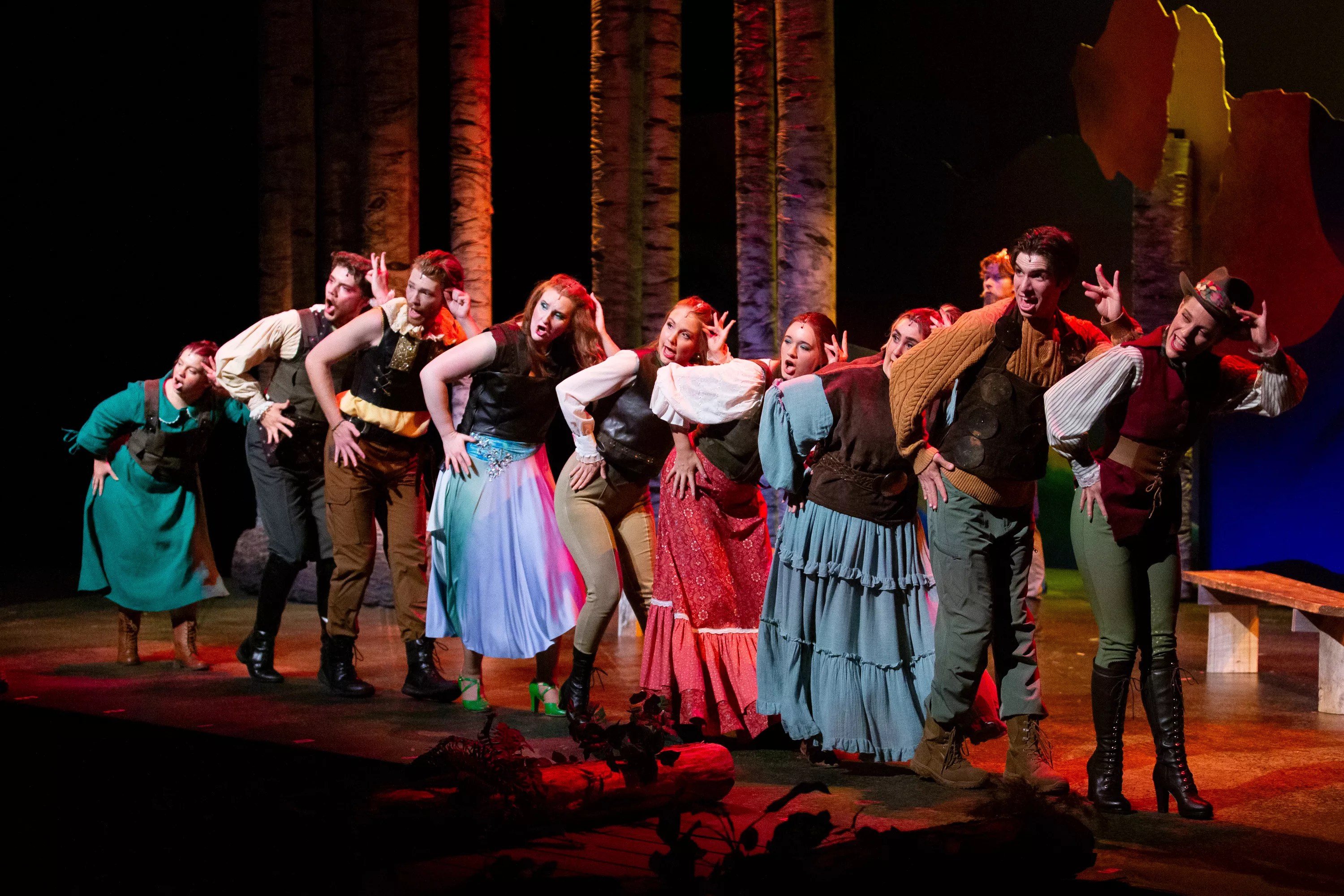 Actors perform a musical number onstage.