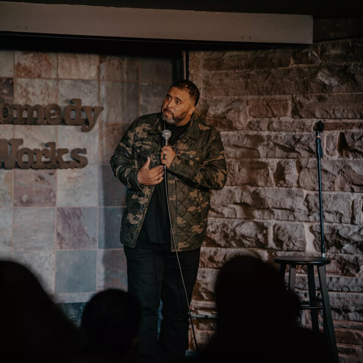 A comedian performs on stage at Comedy Works.