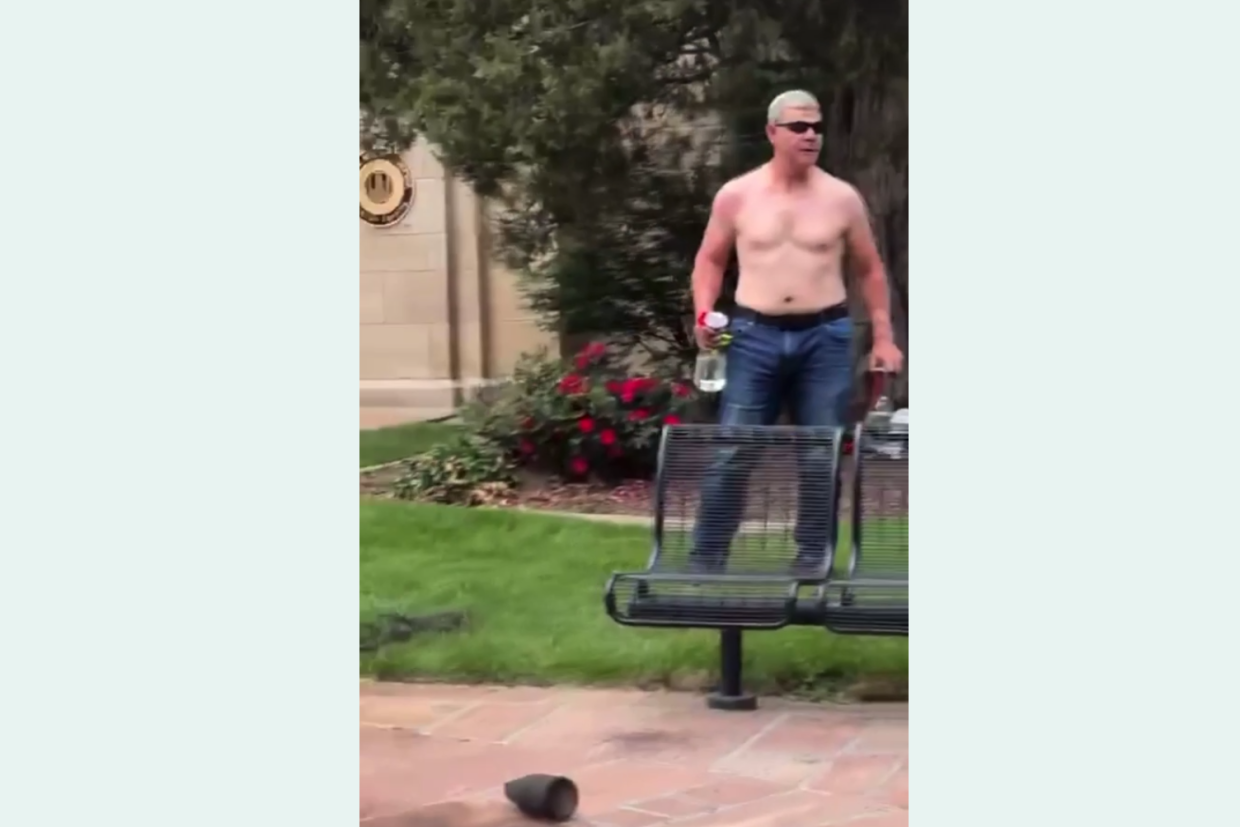 Boulder fire attacker stands wihtout shirt on