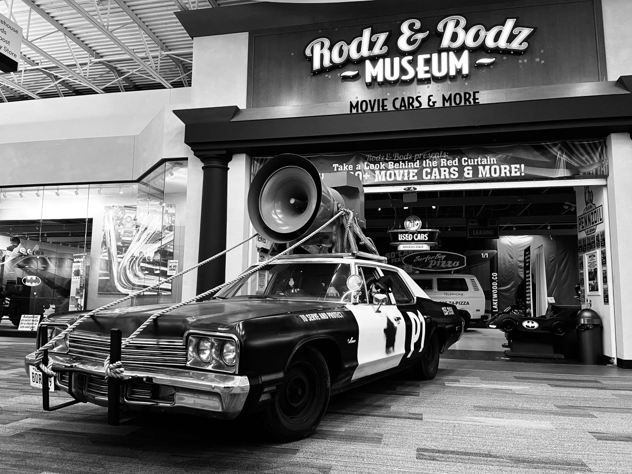A police car stands in front of the Rodz and Bodz Museum when it was located at Colorado Mills.