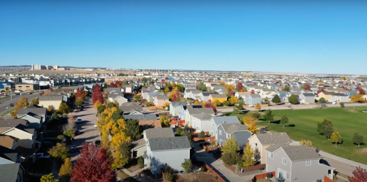 An overhead view of a neighborhood in the fall