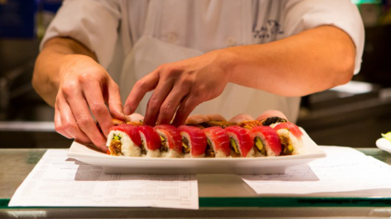 chef making sushi