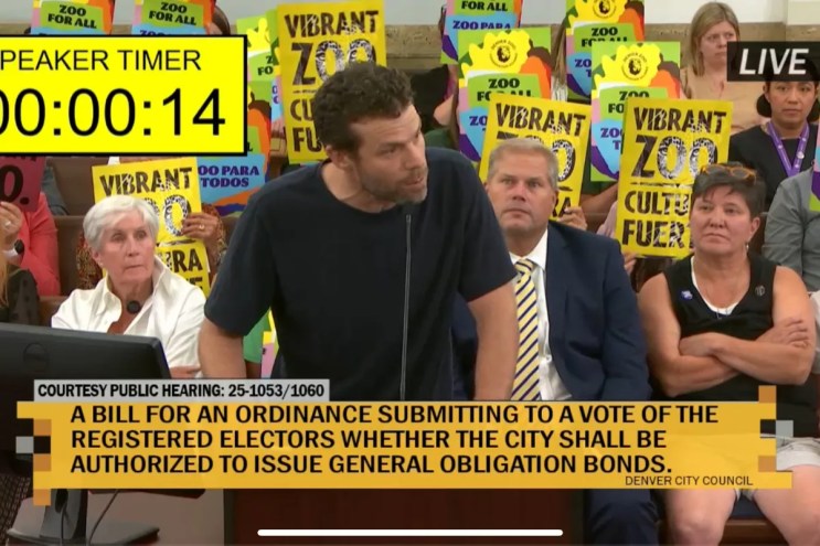 Avi Stopper speaks at a City Council hearing.