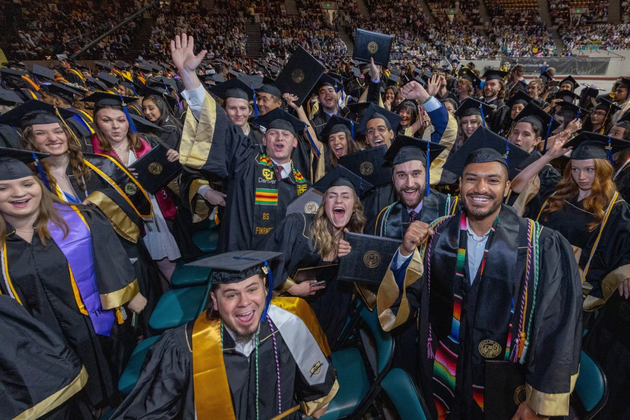 students celebrate graduation