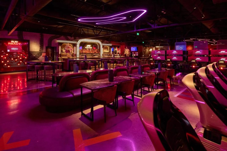 intreior of a bar with racing simulators